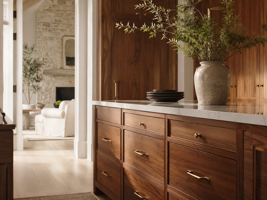 Cabinet and cupboard work in Dubai — walnut drawers with brass handles